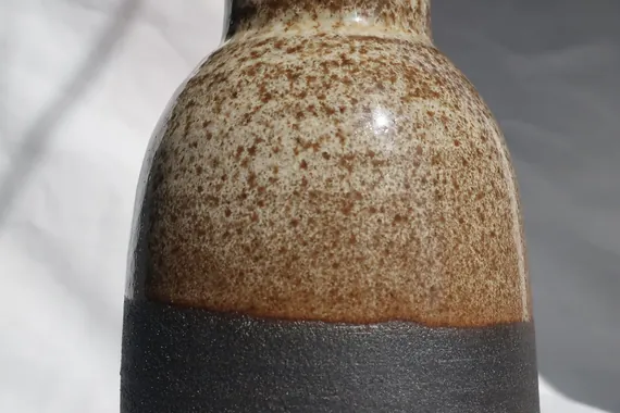Narrow brown vase